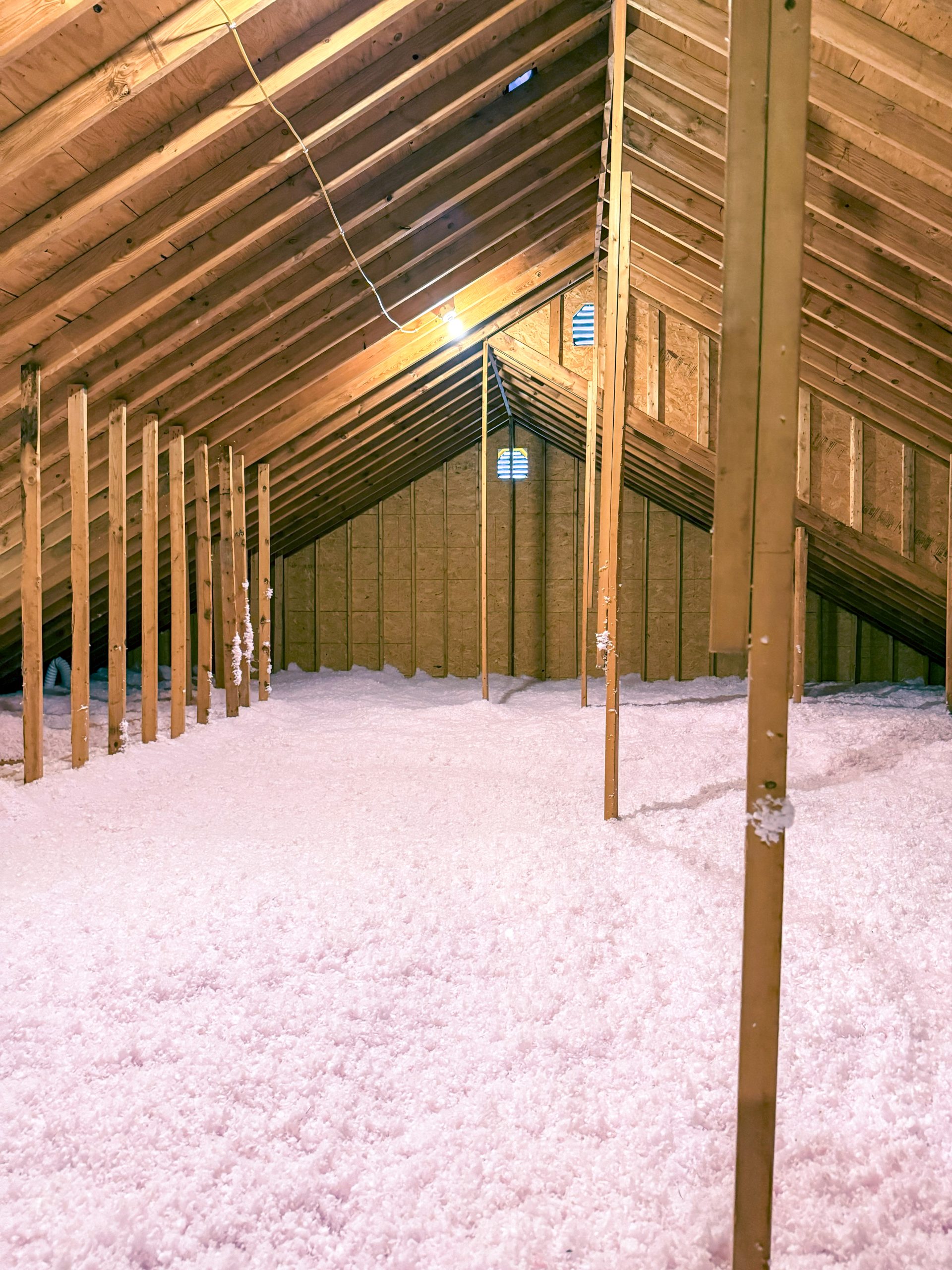 Loose Fill Fiberglass insulation in attic